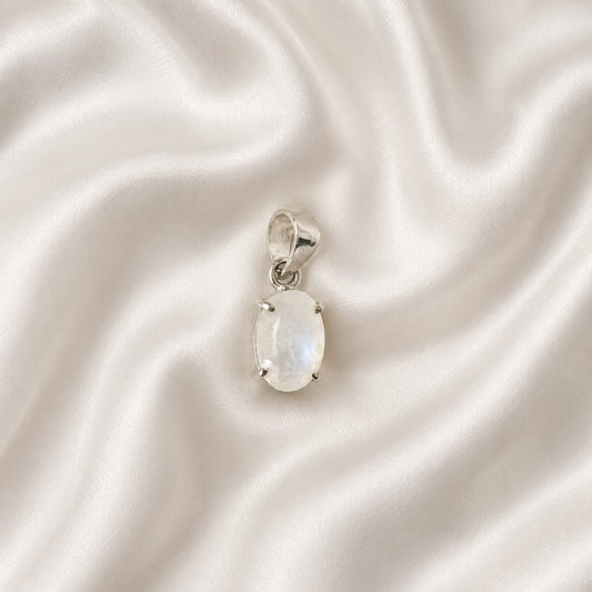 "Natural Moonstone crystal pendant featuring a luminous gemstone with an iridescent glow, elegantly crafted for everyday wear, emotional balance, intuition, and stylish spiritual jewelry."